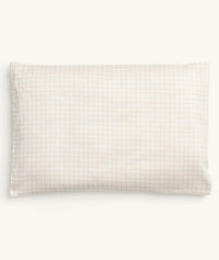 Product shot of ergoPouch Organic Toddler Pillow Case in Caramel Grid